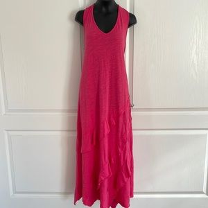 Long flowing dress with V neck sleeveless bottom starts a diagonal frill design